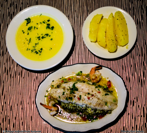 A fabulous dinner featuring our Island Fish served with greek potatoes and Avgolemono